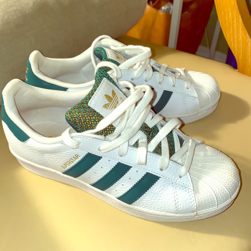 Classic “Superstar” green striped Adidas sneakers